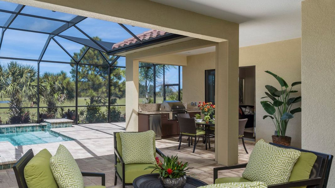 Exterior details and patio area of a home in Canoe Creek Real Estate and Homes for Sale in Parrish, FL - Neal Communities, Parrish (Image 4). Exterior details and patio area of a home in Canoe Creek Real Estate and Homes for Sale in Parrish, FL - Neal Communities, Parrish (Image 4).
