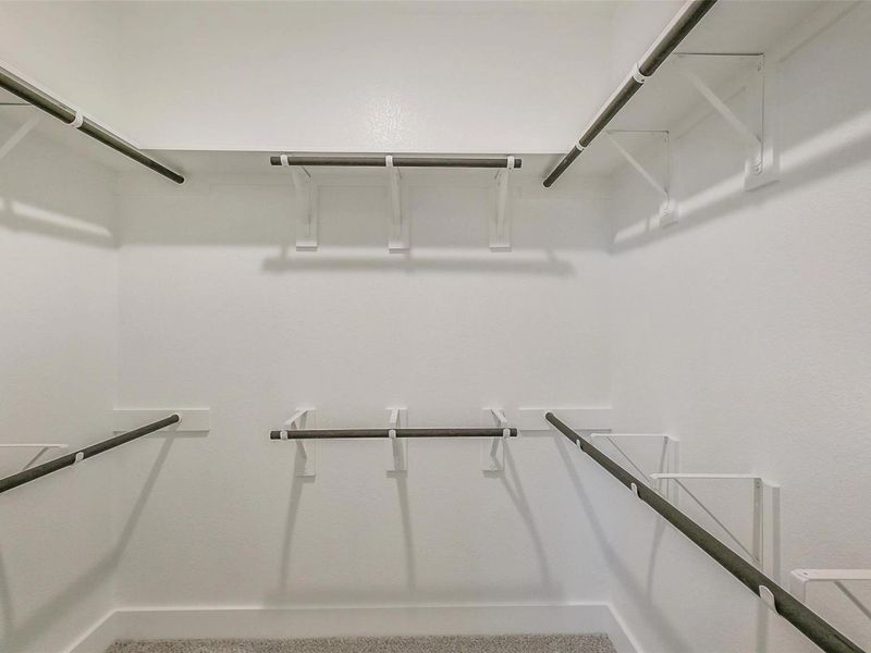 Spacious, unfurnished interior of a new home in Sunterra, Katy (Image 28).