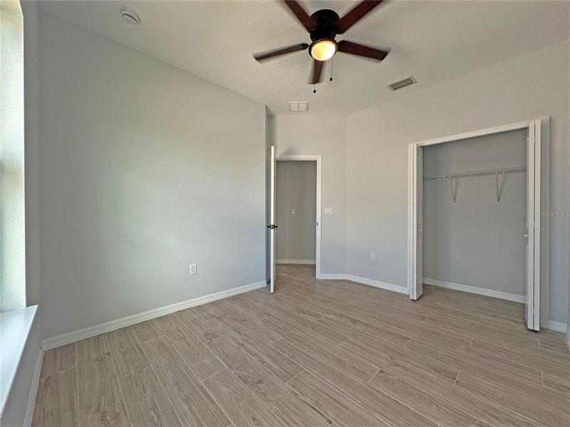 Spacious, unfurnished interior of a new home in , Port Charlotte (Image 23).