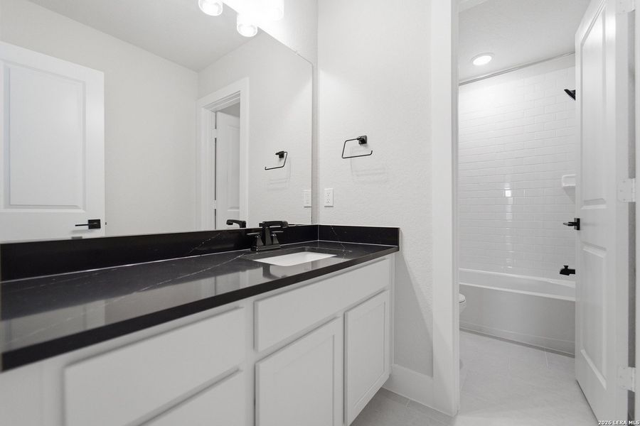 Furnished interior view inside a new home in The Woodlands at Medina Hills, Mico (Image 7).