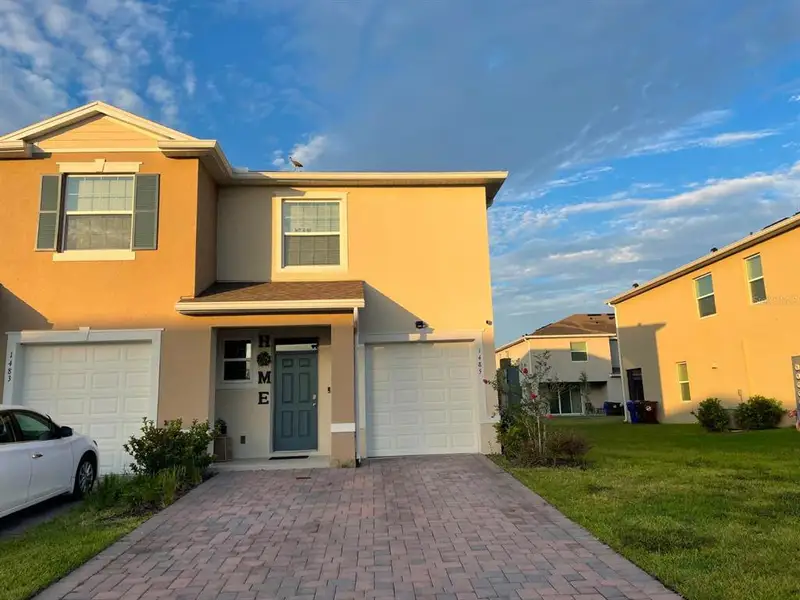 Front exterior of a new home in , Kissimmee, FL, highlighting curb appeal (Image 2). Front exterior of a new home in , Kissimmee, FL, highlighting curb appeal (Image 2).