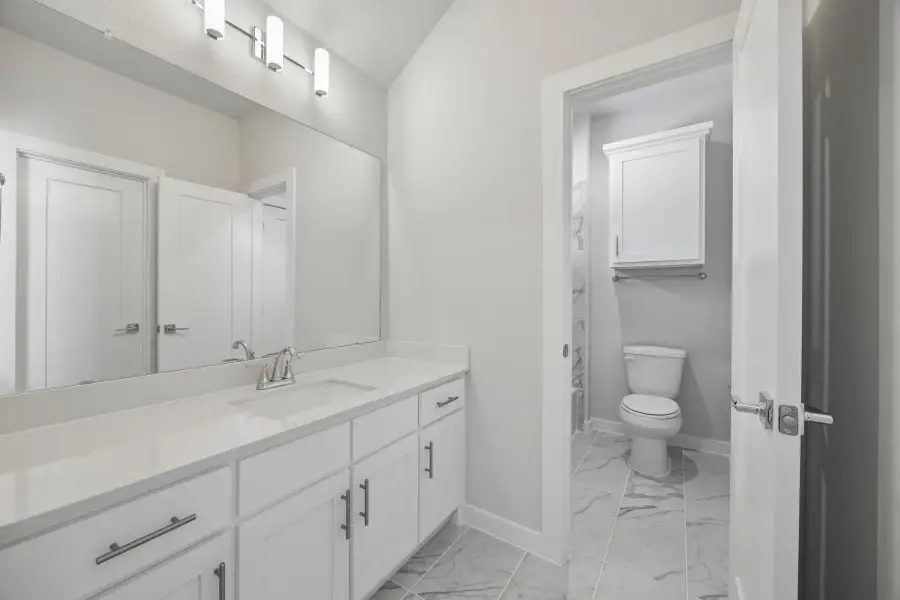 Primary Bathroom in the Monet II home plan by Trophy Signature Homes – REPRESENTATIVE PHOTO Primary Bathroom in the Monet II home plan by Trophy Signature Homes – REPRESENTATIVE PHOTO