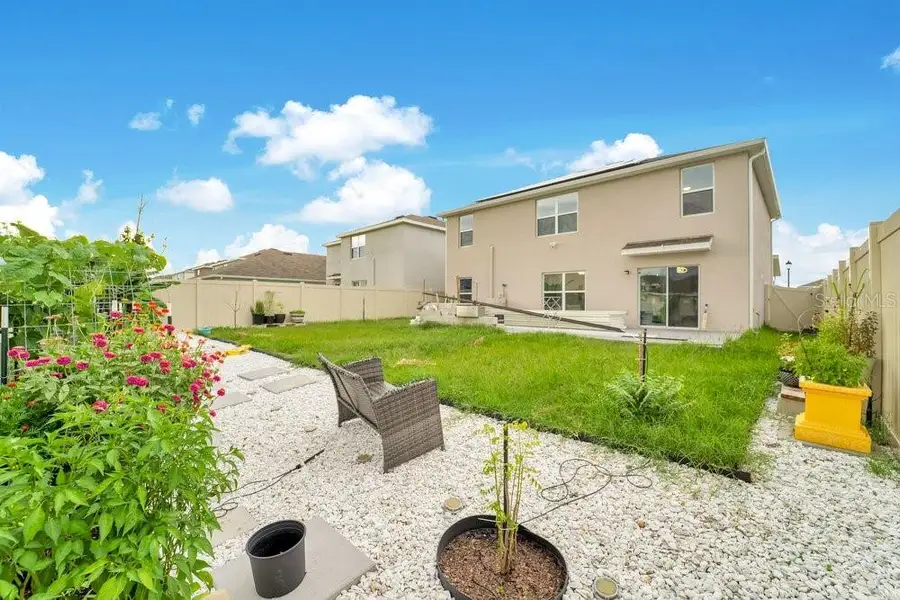 Exterior details and patio area of a home in , Zephyrhills (Image 3).