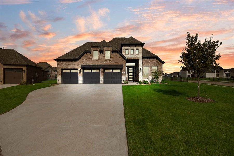 Front exterior of a new home in , Heath, TX, highlighting curb appeal (Image 18). Front exterior of a new home in , Heath, TX, highlighting curb appeal (Image 18).