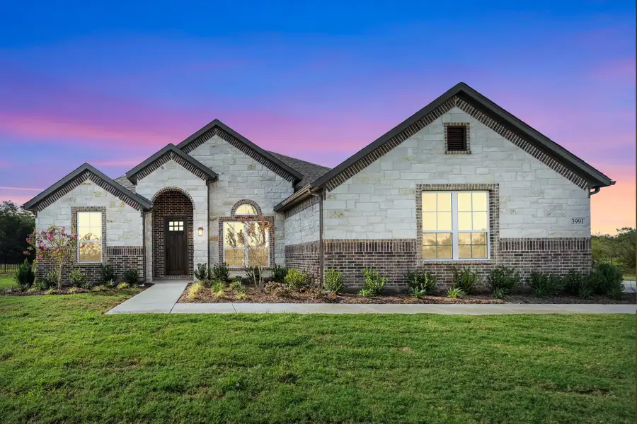 Front exterior of a new home in Vista Oaks Estates, Royse City, TX, highlighting curb appeal (Image 1). Front exterior of a new home in Vista Oaks Estates, Royse City, TX, highlighting curb appeal (Image 1).