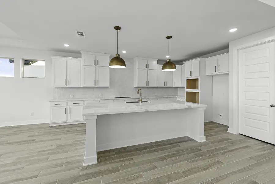 Furnished interior view inside a new home in Bridgeland, Cypress (Image 4).