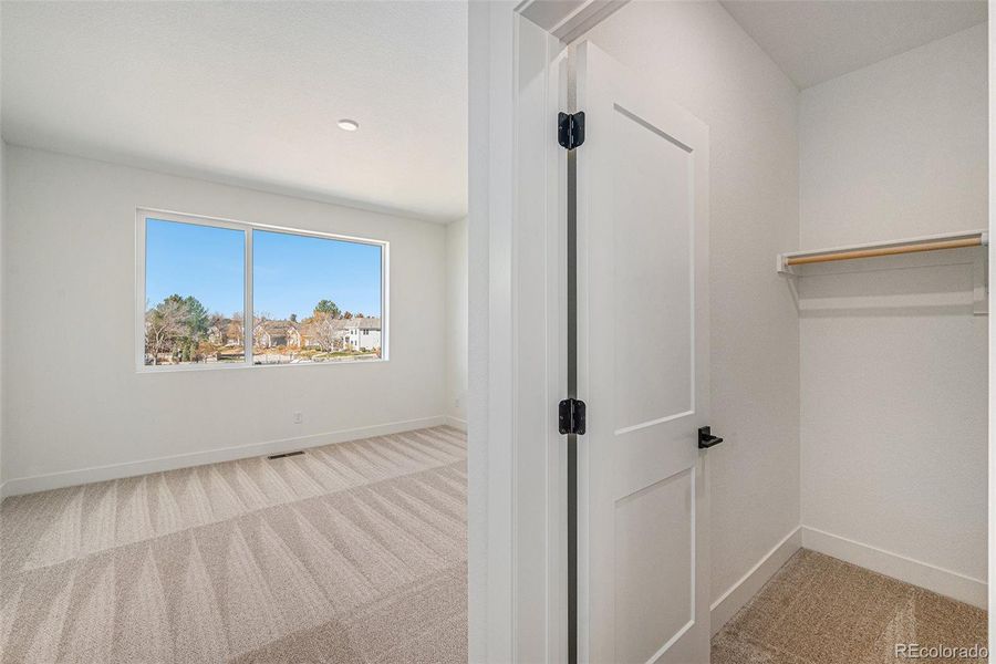 Spacious, unfurnished interior of a new home in Prelude at TAVA Waters, Denver (Image 22).
