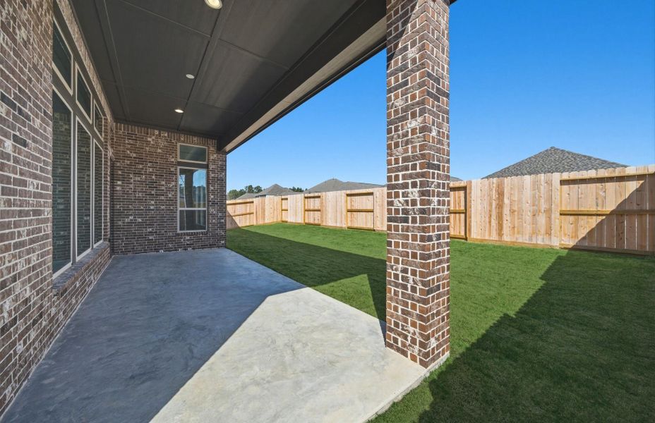 Exterior details and patio area of a home in The Highlands 55′, Porter (Image 3).