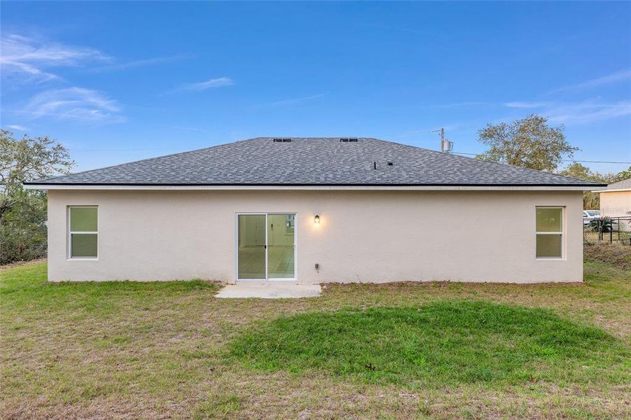 Exterior details and patio area of a home in , Citrus Springs (Image 21).