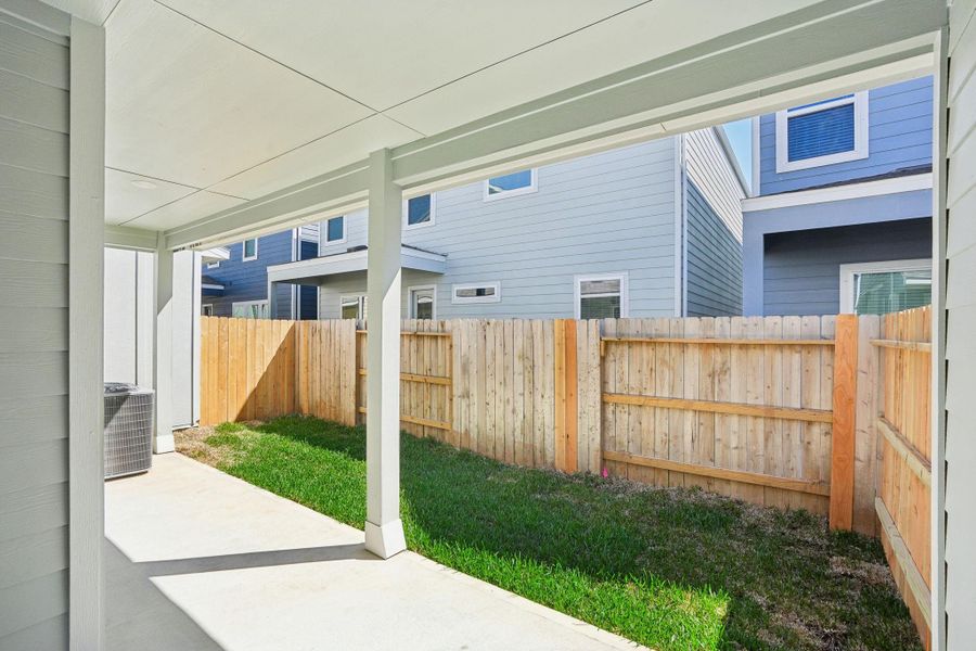 Exterior details and patio area of a home in Kemah Crossing - City Series, Kemah (Image 30).