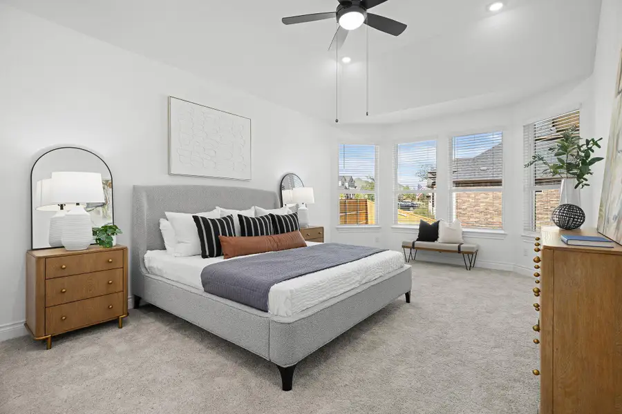 Bedroom featuring carpet flooring, a ceiling fan, and recessed lighting