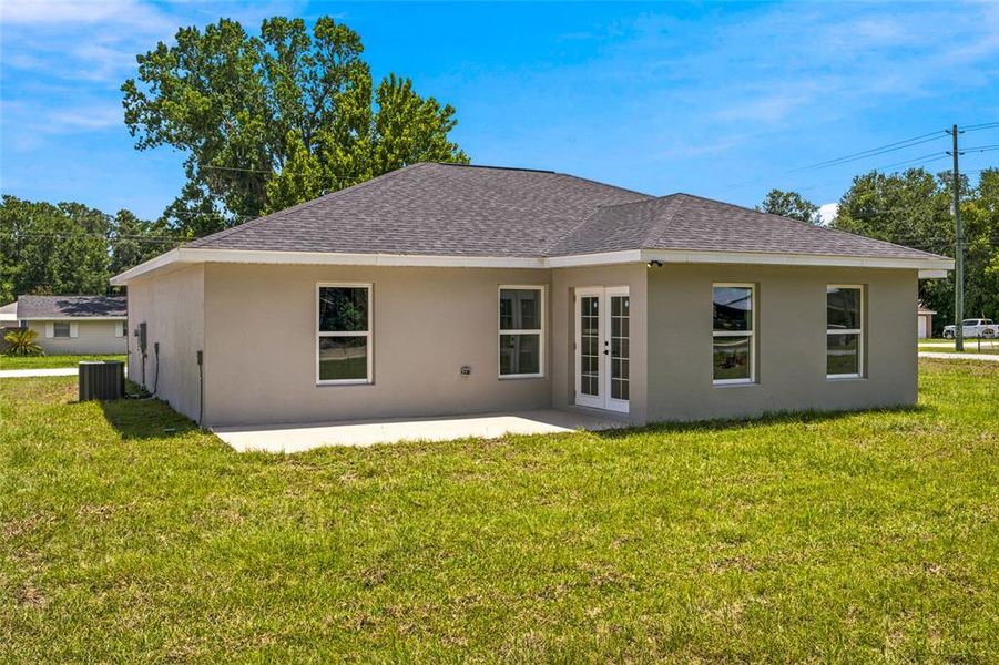 Exterior details and patio area of a home in , Summerfield (Image 22).