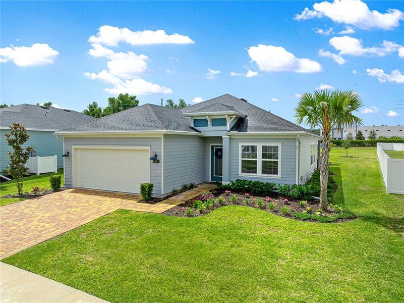 Front exterior of a new home in , Ocala, FL, highlighting curb appeal (Image 25).
