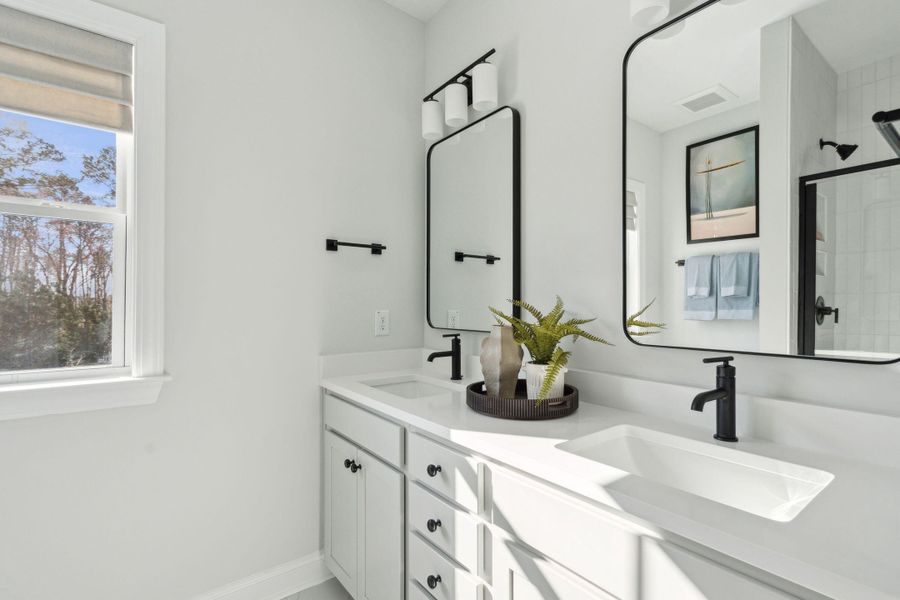 Furnished interior view inside a new home in Tidewater at Lakes of Cane Bay, Summerville (Image 28).