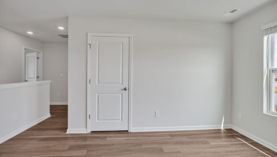 Representative unfurnished interior of a home built from the Hayden by D.R. Horton in Cedar Hill Landing, Navassa (Image 32).