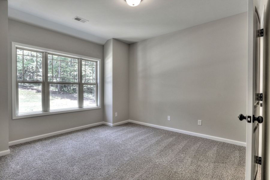 Representative unfurnished interior of a home built from the The Huntleigh by Bamford and Company in Rowland Springs, Cartersville (Image 42).
