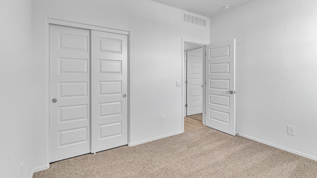 Spacious, unfurnished interior of a new home in Coronet at Gladden Farms, Marana (Image 34). Spacious, unfurnished interior of a new home in Coronet at Gladden Farms, Marana (Image 34).