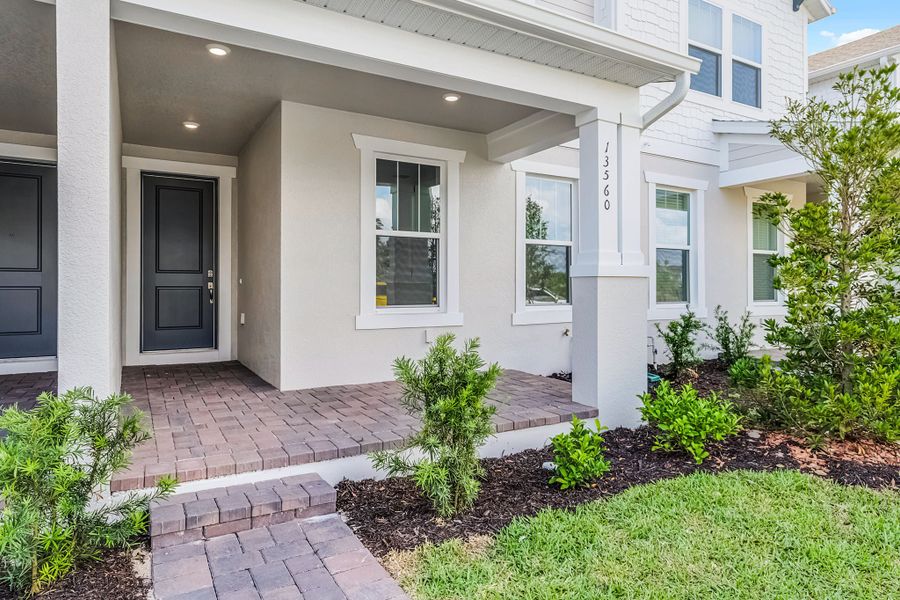 Representative exterior details of a home built from the Newton by Rockwell Homes in Harvest at Ovation - Townhomes, Winter Garden (Image 45). Representative exterior details of a home built from the Newton by Rockwell Homes in Harvest at Ovation - Townhomes, Winter Garden (Image 45).
