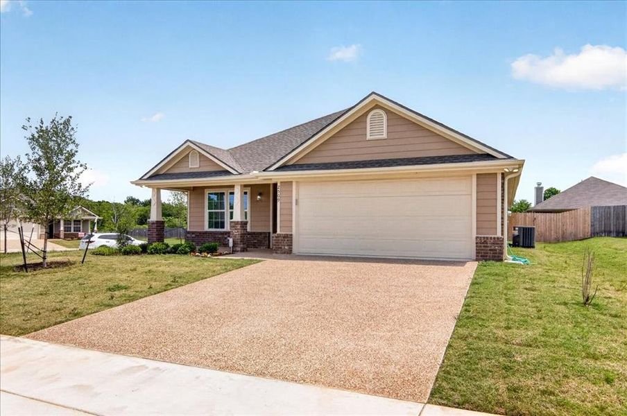 Front exterior of a new home in , Robinson, TX, highlighting curb appeal (Image 22).