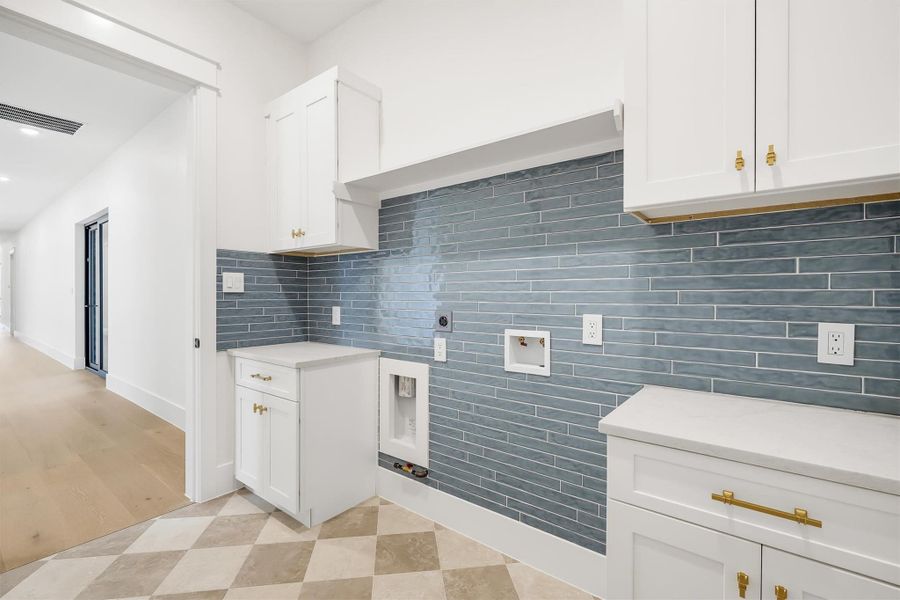 A second laundry room upstairs makes it easy to handle your clothes located on the second story.