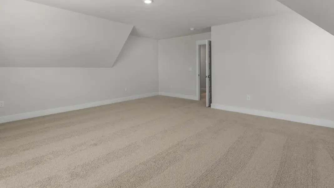 Spacious, unfurnished interior of a new home in The Highlands at Cedar Hill Landing, Navassa (Image 32).