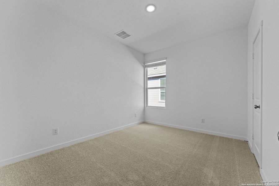 Spacious, unfurnished interior of a new home in Waterwheel: Coastline Collection, San Antonio (Image 16).