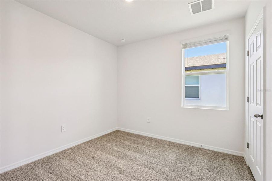 Spacious, unfurnished interior of a new home in Lake Deer Estates - Classic Series, Poinciana (Image 15).