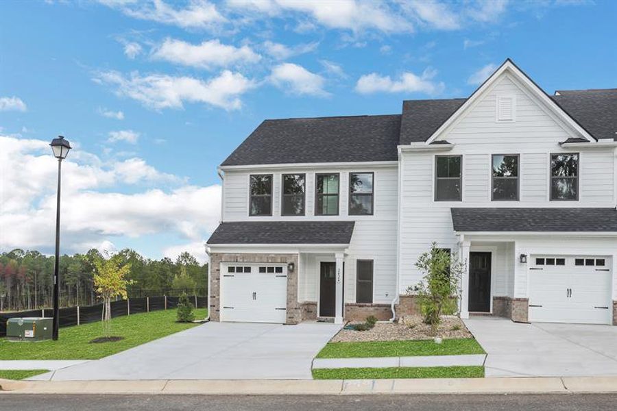 Front exterior of a new home in Laurel Fields, Gainesville, GA, highlighting curb appeal (Image 22).