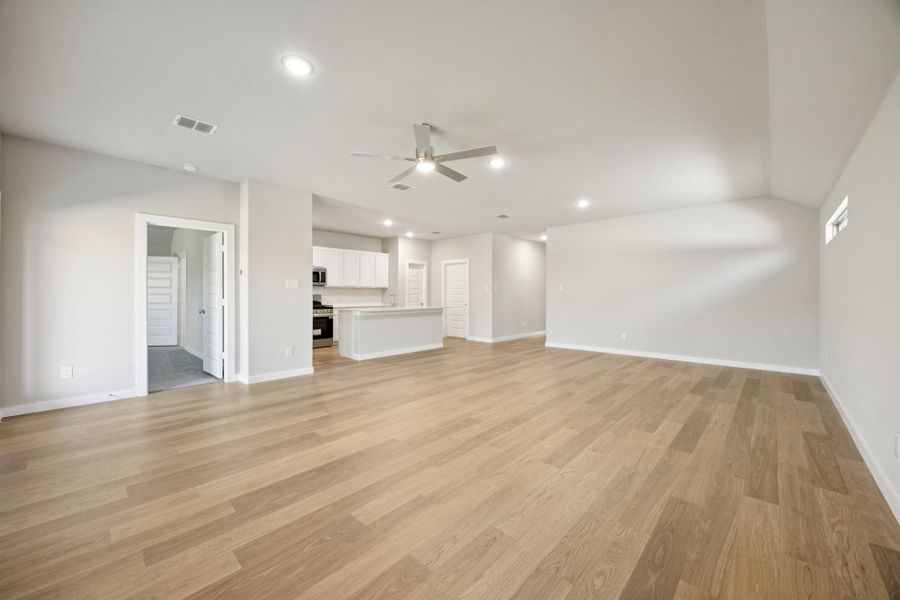 Open Floor Plan in the Oscar home plan by Trophy Signature Homes – REPRESENTATIVE PHOTO Open Floor Plan in the Oscar home plan by Trophy Signature Homes – REPRESENTATIVE PHOTO