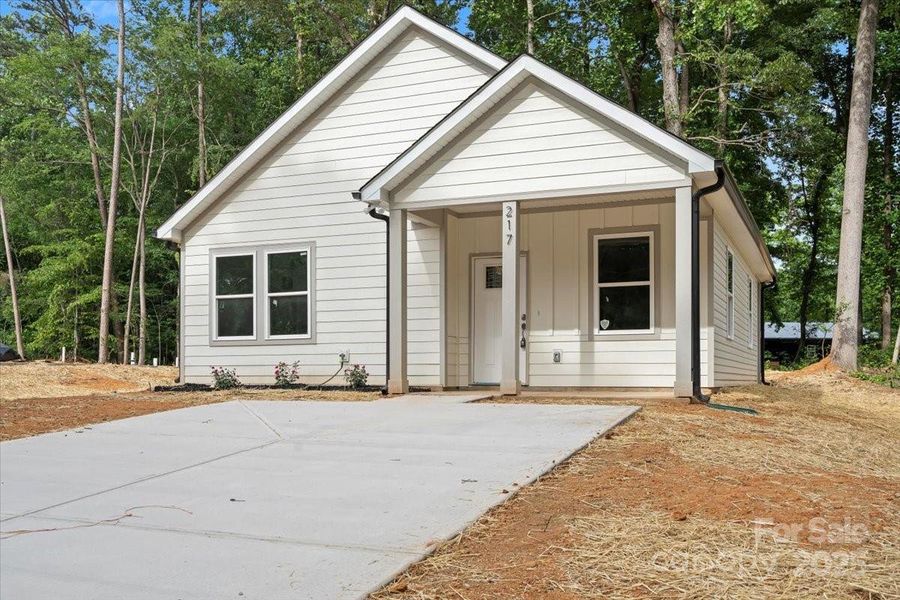 Front exterior of a new home in , Salisbury, NC, highlighting curb appeal (Image 1).