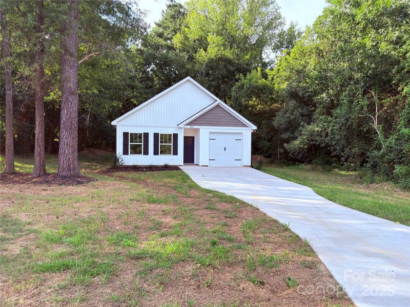 Front exterior of a new home in , Norwood, NC, highlighting curb appeal (Image 22).