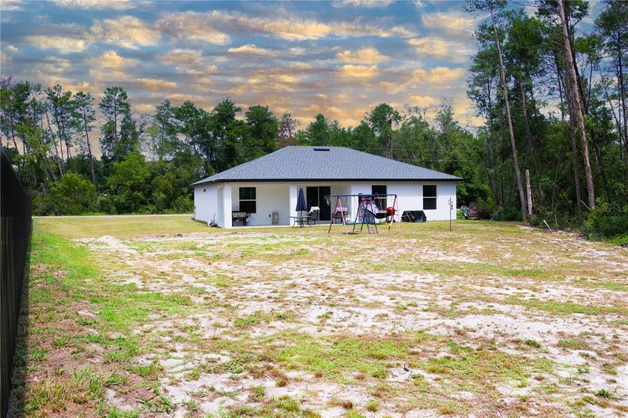 Exterior details and patio area of a home in , Ocala (Image 4).