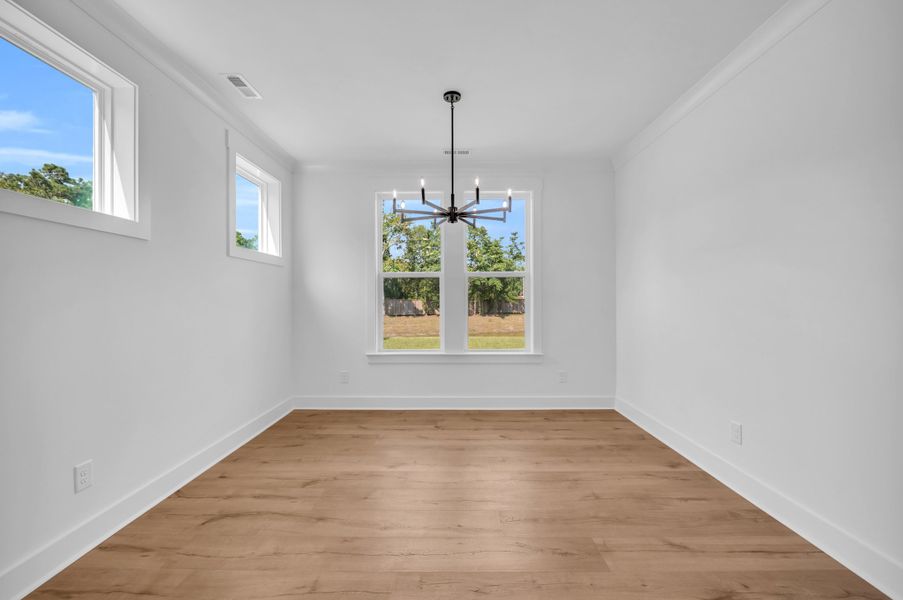 Representative unfurnished interior of a home built from the The Bradley by RobuckHomes in Windwater, Hampstead (Image 23).