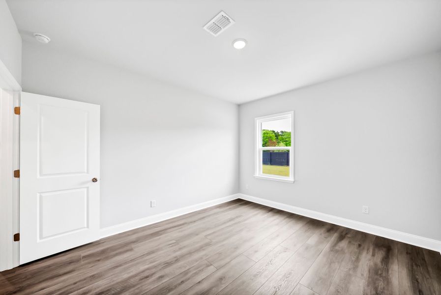 Spacious, unfurnished interior of a new home in Monroe Preserve, Chapin (Image 50).