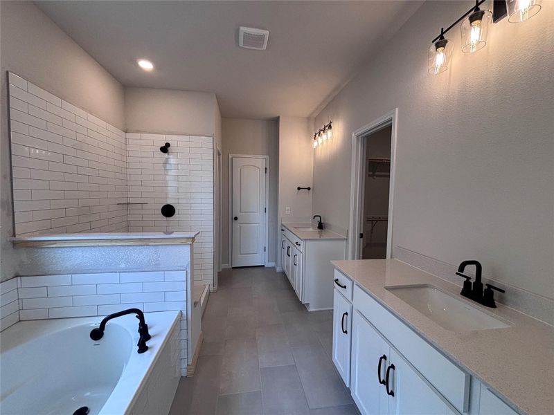 Furnished interior view inside a new home in The Colony, Bastrop (Image 6).