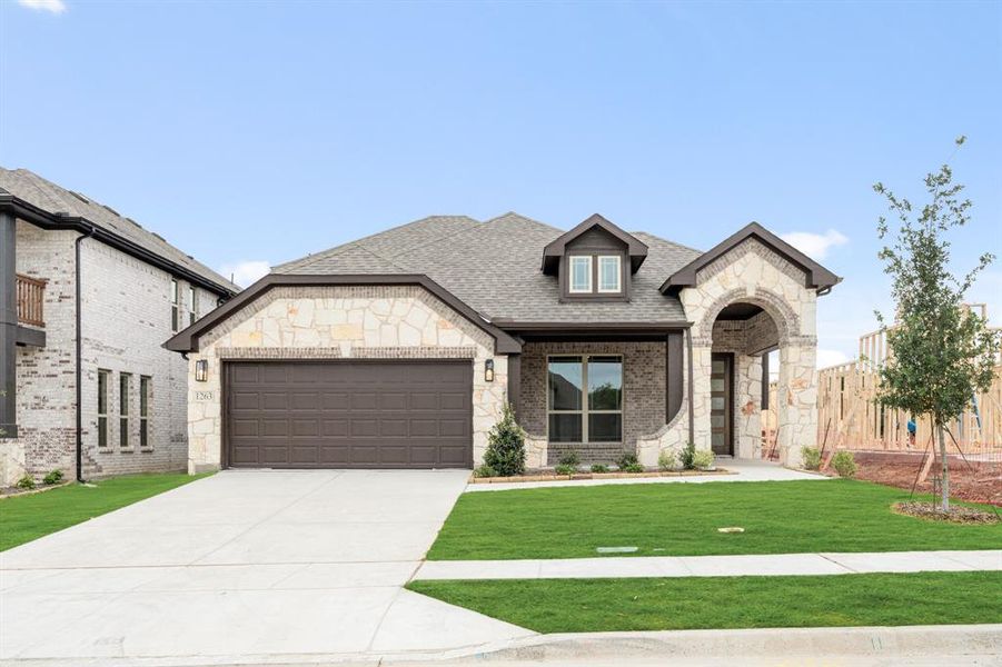 Front exterior of a new home in Anderson Crossing, Trenton, TX, highlighting curb appeal (Image 23). Front exterior of a new home in Anderson Crossing, Trenton, TX, highlighting curb appeal (Image 23).