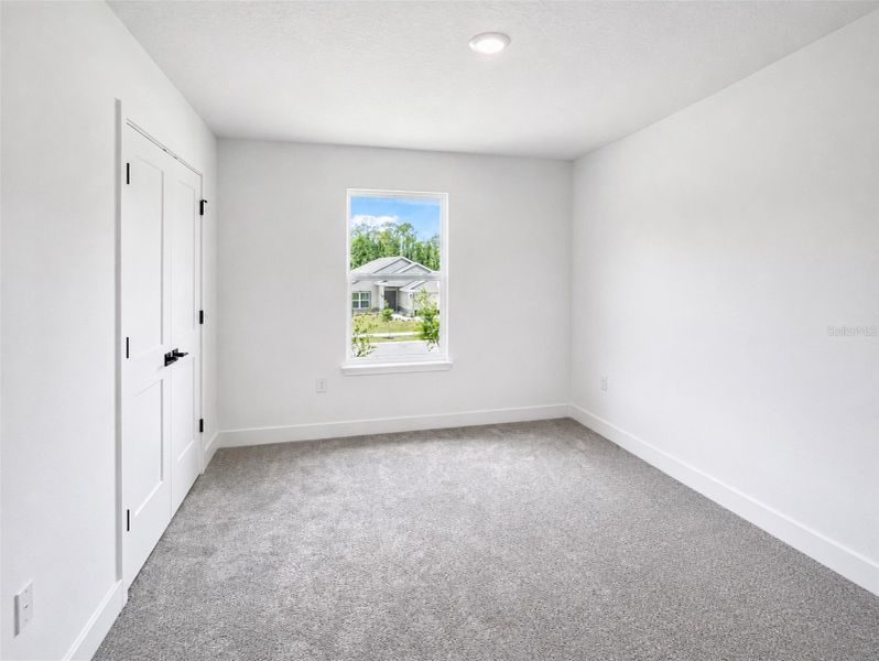 Spacious, unfurnished interior of a new home in Harmony Central, St. Cloud (Image 17).