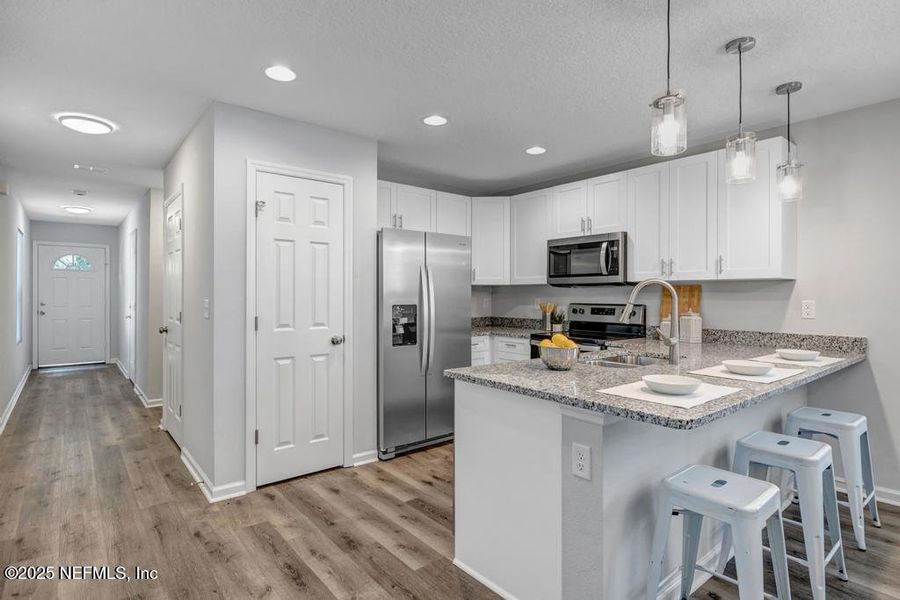 Furnished interior view inside a new home in , Jacksonville (Image 17).