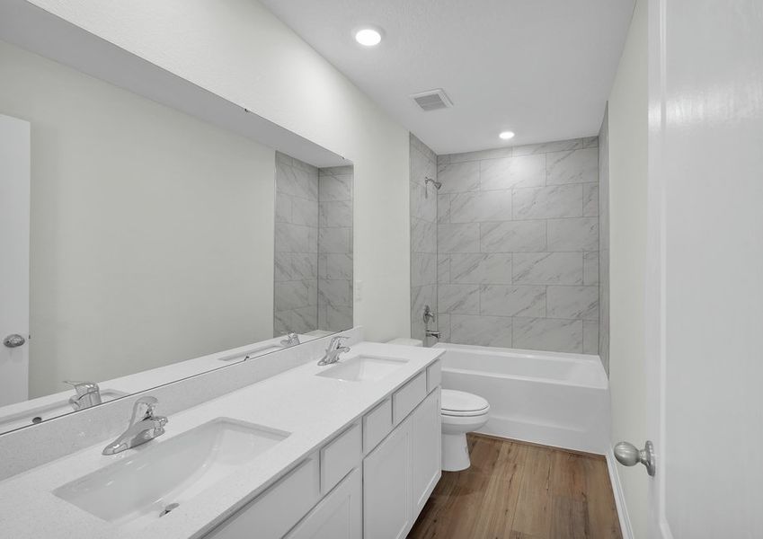 Your guests can get ready for their day in secondary bathroom