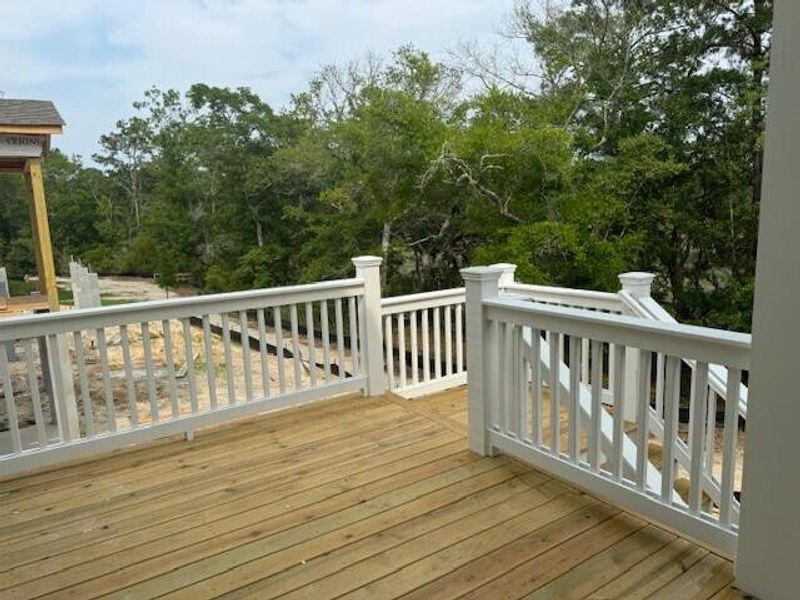 Front exterior of a new home in Oak Bluff, Charleston, SC, highlighting curb appeal (Image 25). Front exterior of a new home in Oak Bluff, Charleston, SC, highlighting curb appeal (Image 25).