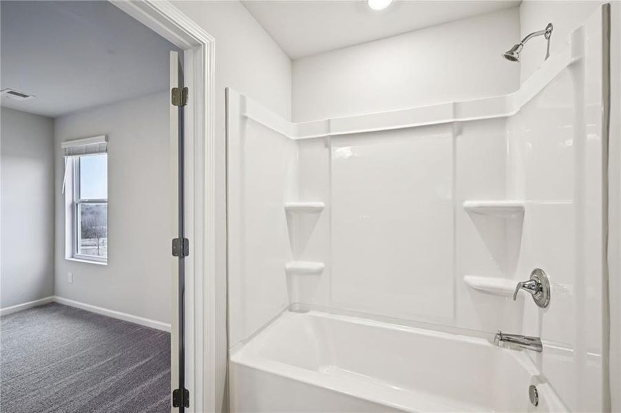 Furnished interior view inside a new home in The Hills at Cedar Creek, Winder (Image 31).