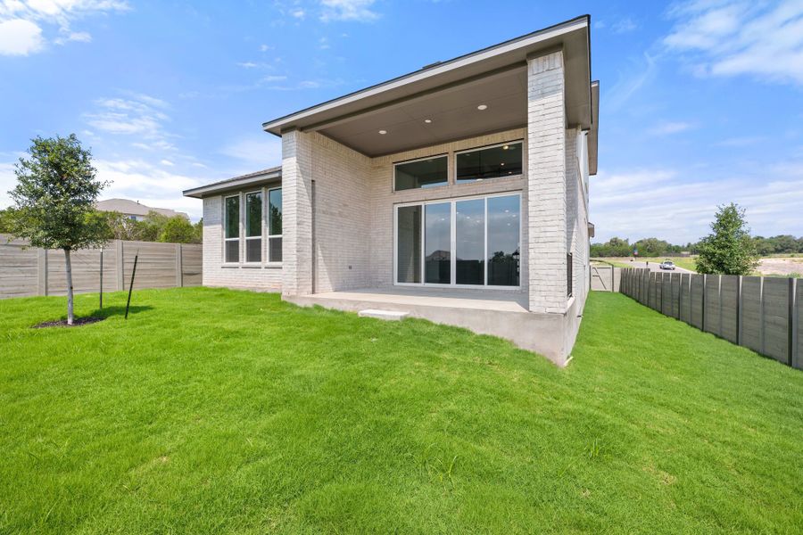 Exterior details and patio area of a home in Wolf Ranch, Georgetown (Image 30).