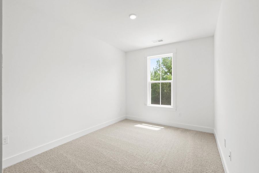 Spacious, unfurnished interior of a new home in Long Bay Golf Club, Longs (Image 36).