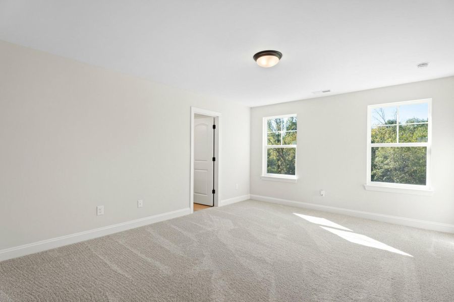 Spacious, unfurnished interior of a new home in Cottages at Piper Village, Trinity (Image 24).