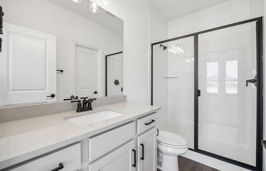 Furnished interior view inside a new home in Highland Lakes, McKinney (Image 9).