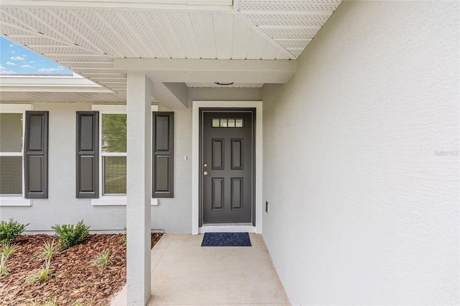 Front exterior of a new home in , Belleview, FL, highlighting curb appeal (Image 17).