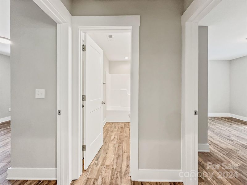 Hallway to secondary bedrooms and bathroom