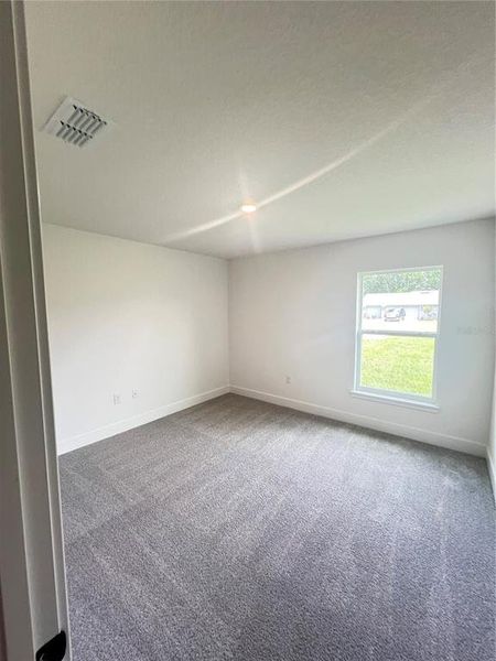 Spacious, unfurnished interior of a new home in Hill Country Estates, Dade City (Image 20).