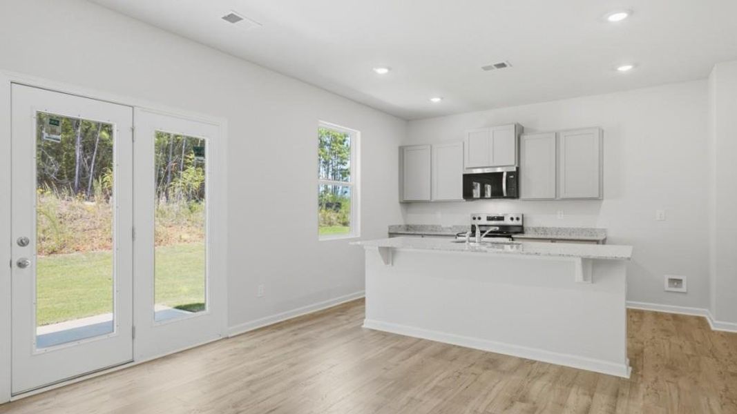 Furnished interior view inside a new home in Oaks at Cedar Grove, Fairburn (Image 6).