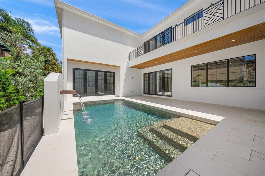 Exterior details and patio area of a home in , Sarasota (Image 2).